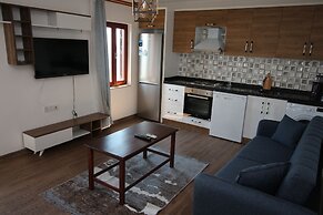 Gumusluk Tramonto Evleri