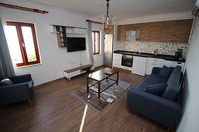 Gumusluk Tramonto Evleri