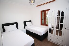 Gumusluk Tramonto Evleri