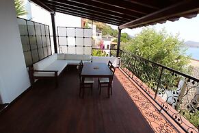 Gumusluk Tramonto Evleri