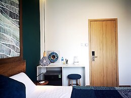 Benzen Boutique Stays Hostel and Apartment