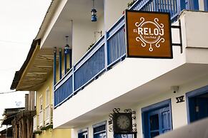 El reloj casa hotel