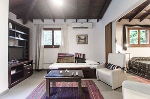 Bright Studio surrounded by trees