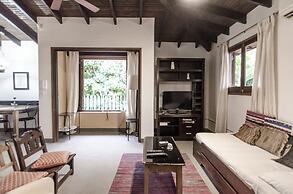 Bright Studio surrounded by trees