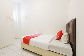 OYO 1111 Pasar Baru Inn