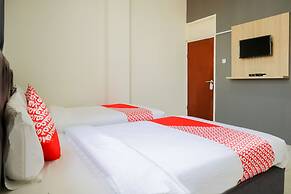 OYO 1111 Pasar Baru Inn