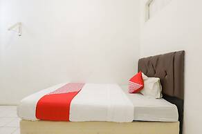 OYO 1111 Pasar Baru Inn