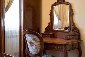 At the Fountain Apartment