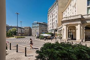 At the Fountain Apartment