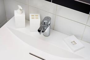 At the Fountain Apartment