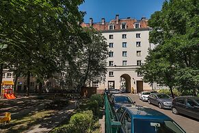 At the Fountain Apartment