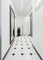 At the Fountain Apartment