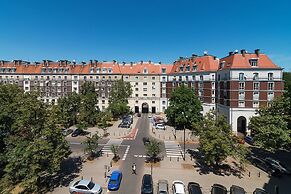 At the Fountain Apartment