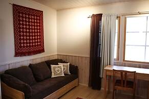 Isokenkäisten Klubi, Wilderness lodge