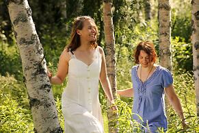 Isokenkäisten Klubi, Wilderness lodge