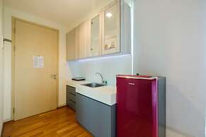 Great Location Studio at Tree Park Apartment