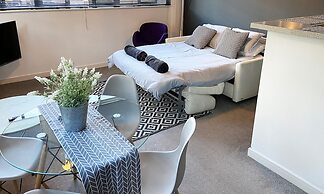 Continental Apartments at Wallis Square with Parking, WiFi & Netflix