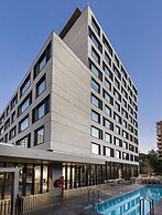 Ola Santiago Providencia, Tapestry Collection by Hilton