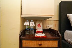 Super OYO 710 Naomi Heritage