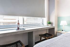 Athenian Downtown Studios by Livin Urbban