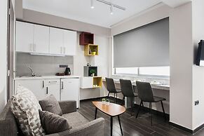 Athenian Downtown Studios by Livin Urbban