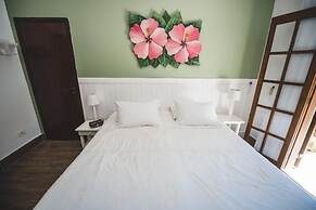 Pousada Chez Louise et Louis Pé na Areia