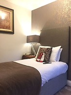 De Rougemont Manor Hotel & Suites