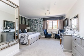 De Rougemont Manor Hotel & Suites