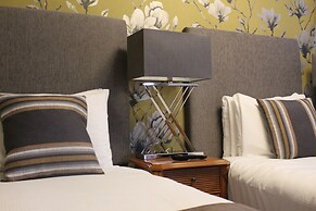 De Rougemont Manor Hotel & Suites