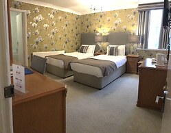 De Rougemont Manor Hotel & Suites