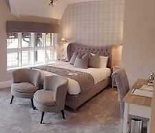 De Rougemont Manor Hotel & Suites