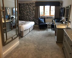 De Rougemont Manor Hotel & Suites