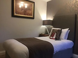 De Rougemont Manor Hotel & Suites