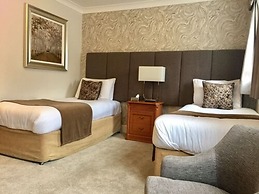 De Rougemont Manor Hotel & Suites