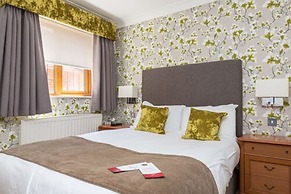 De Rougemont Manor Hotel & Suites