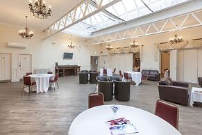 De Rougemont Manor Hotel & Suites