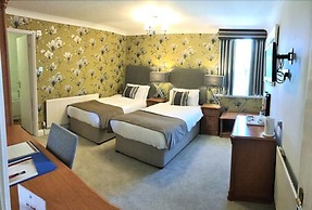 De Rougemont Manor Hotel & Suites