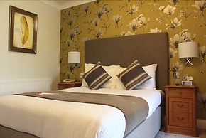 De Rougemont Manor Hotel & Suites