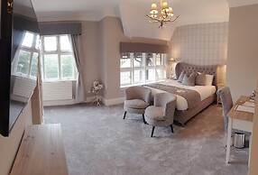 De Rougemont Manor Hotel & Suites