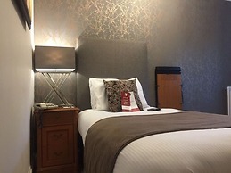 De Rougemont Manor Hotel & Suites