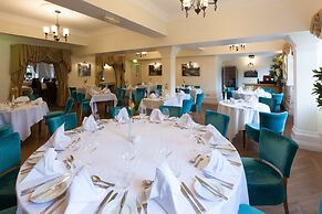 De Rougemont Manor Hotel & Suites