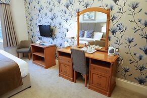 De Rougemont Manor Hotel & Suites