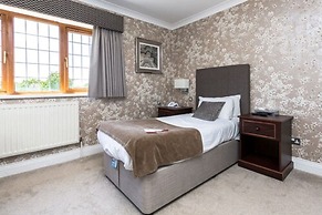 De Rougemont Manor Hotel & Suites