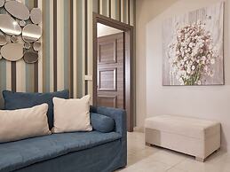 Koukounaria Hotel & Suites