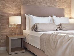 Koukounaria Hotel & Suites