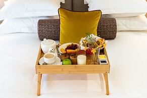 Le Petit Village Hotel & Spa