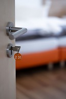 Orange Hotel und Apartments