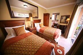 Le Cozmo Guest House