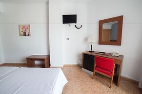 Hotel La Familia Gallo Rojo