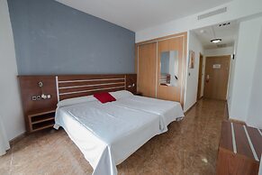 Hotel La Familia Gallo Rojo